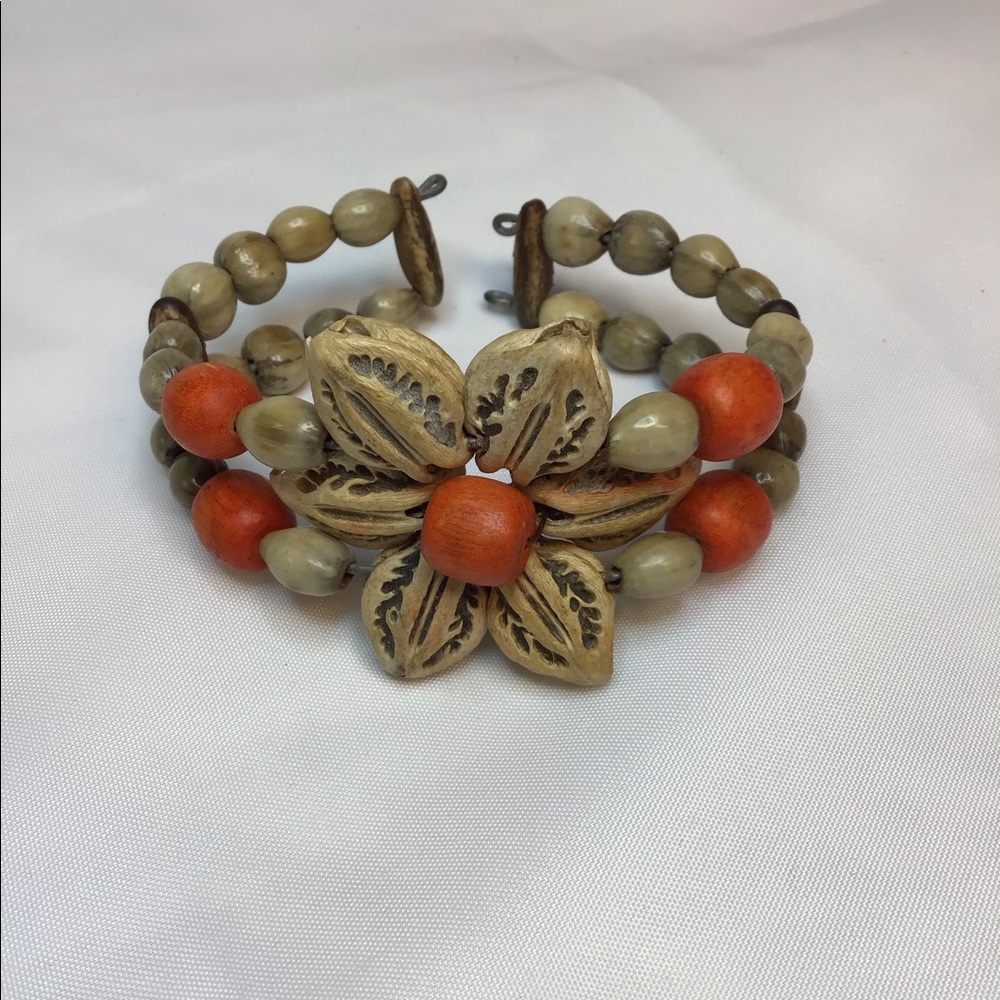 HANDCRAFTED SEEDS & SHELLS CUFF